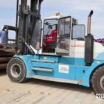 Handling gas pipes in Takoradi, Ghana.