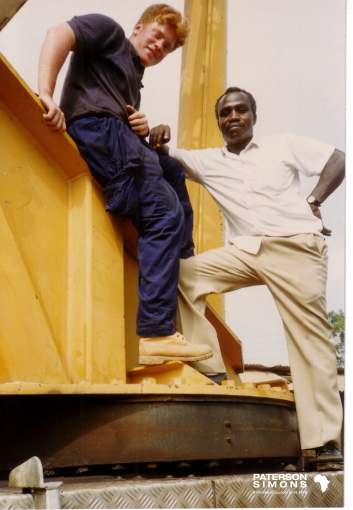 Henry Lyne, Director of Group Strategy at Paterson Simons, on the left, and William Kwabena Asiedu (Willie Asiedu) on the right. (Willie Asiedu worked at Pasico for 44 years before retiring, he sadly passed away in October 2021 at the age of 74).