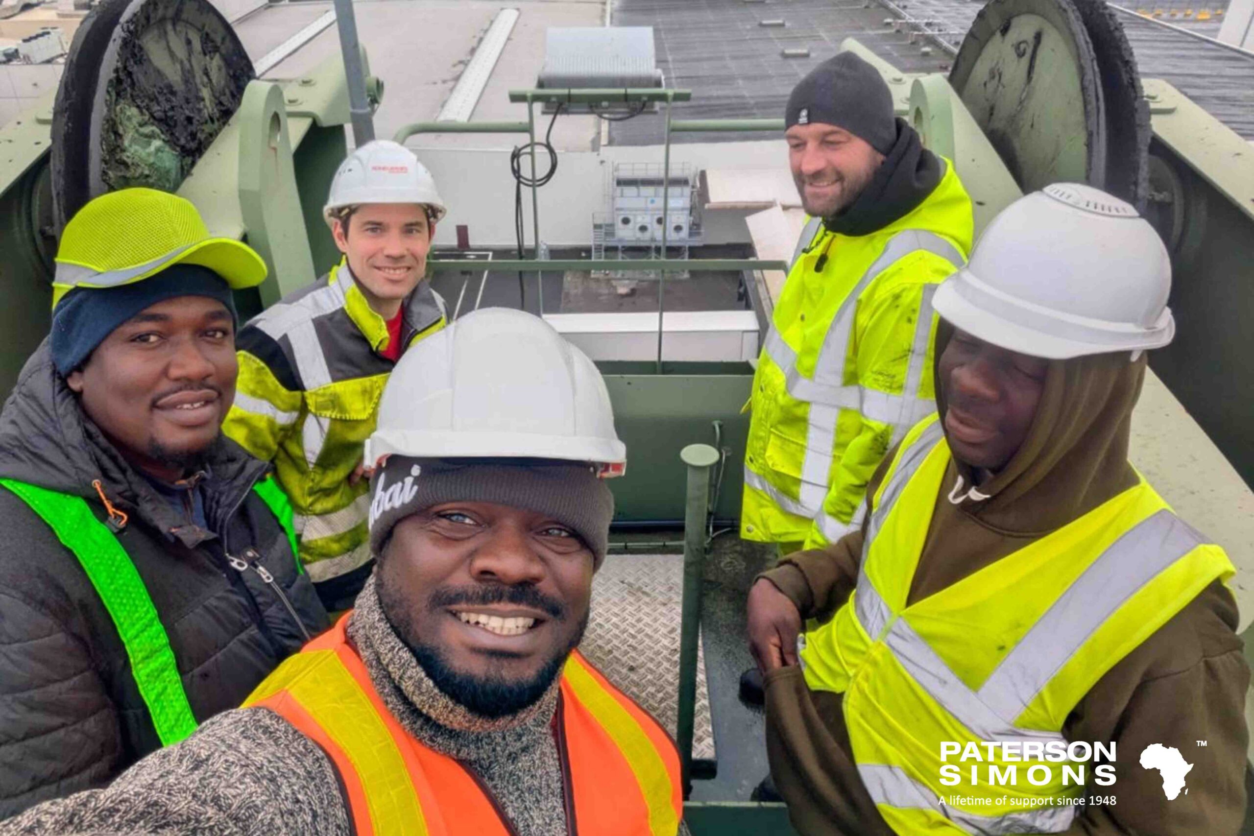 Paterson Simons engineers have successfully completed specialised Professional Crane Inspection (PCI) training on Konecranes Rubber Tyred Gantry cranes (RTGs) and Mobile Harbour Cranes (MHCs). The programme began with two days of online training delivered from Konecranes training centre in Düsseldorf, led by Marvin Jenneman. The sessions introduced the core principles of the 'Crane Inspection' service product, outlining the role and responsibilities of a PCI Inspector, key requirements for customer communication, and a full overview of the PCI process. Day two focused on the practical tools required for effective inspections, including the use of manual reporting forms, structured checklists, and the digital Inspection App used to standardise and streamline reporting. This was followed by hands-on practical training in Europe, where engineers applied their knowledge in real-world port environments. Training took place in Zeebrugge in Belgium, with a focus on Mobile Harbour Cranes, led by trainer Matthias Pehl, and in Gdansk in Poland, where the team gained practical experience working with RTGs, led by trainer Tuomas Kivistö. By completing both the theoretical and practical components of the programme, Paterson Simons engineers are now equipped to carry out certified Konecranes PCI inspections independently. This enhanced capability supports improved service delivery, increased operational reliability, and greater customer confidence across port and terminal operations in the region. The benefits of having a PCI inspection include improved safety and operational uptime through early detection of potential issues, independent structured reports with clear recommendations, local execution with OEM oversight delivering cost savings, and a clearer view of crane condition to support better asset lifecycle management. PCI inspections also support compliance and audit readiness. Where repairs are identified, PSAL can additionally provide the required repair support - offering customers a convenient one-stop solution. To request a quote or learn more, please contact: service@patersonsimons.com As ports continue to prioritise safety, compliance, and uptime, the ability to deliver certified inspections locally reinforces Paterson Simons role as a trusted technical partner - providing not only equipment, but the expertise required to keep it performing at its best. Congratulations to the participants and thank you to trainers Marvin Jenneman, Matthias Pehl and Tuomas Kivistö!